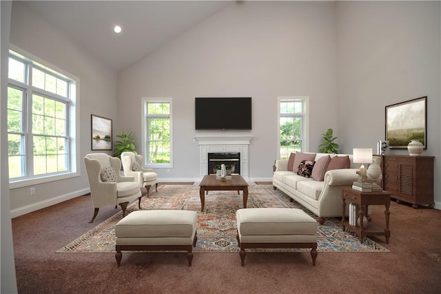 carpeted living room with a healthy amount of sunlight and high vaulted ceiling