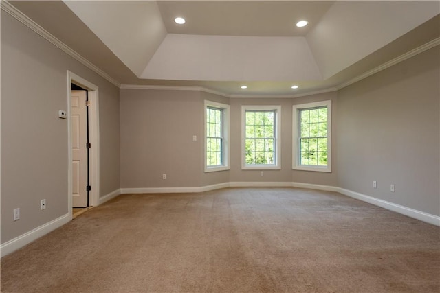 unfurnished room with light carpet, vaulted ceiling, and ornamental molding