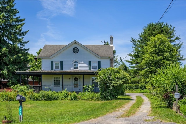 1727 Rte 9, Germantown, NY 12526 - view of front facade featuring a chimney, covered porch, a front lawn, and driveway