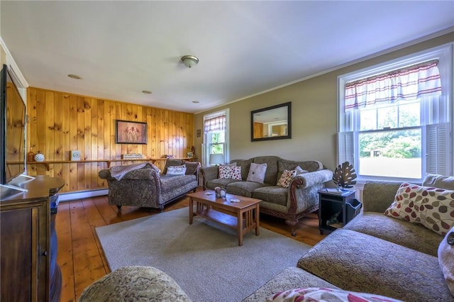 1727 Rte 9, Germantown, NY 12526 - living room with hardwood / wood-style flooring, wood walls, ornamental molding, and baseboard heating