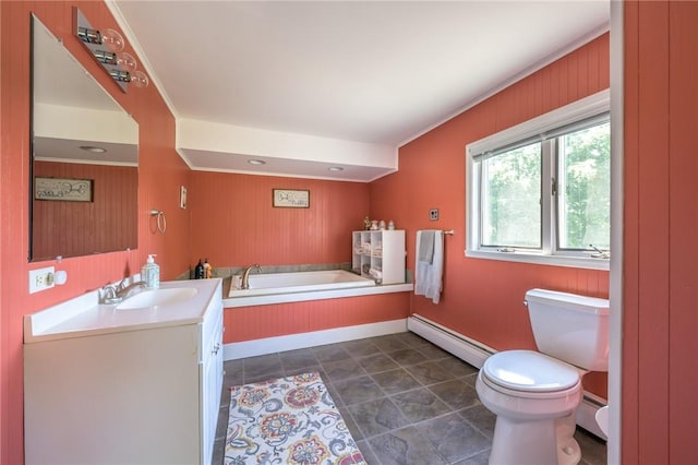 bathroom with vanity, a tub to relax in, toilet, and baseboard heating