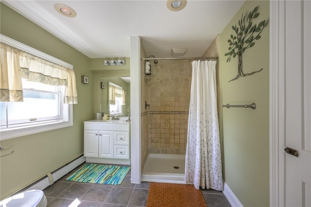 1727 Rte 9, Germantown, NY 12526 - bathroom featuring a baseboard radiator, vanity, a tile shower, and tile patterned flooring
