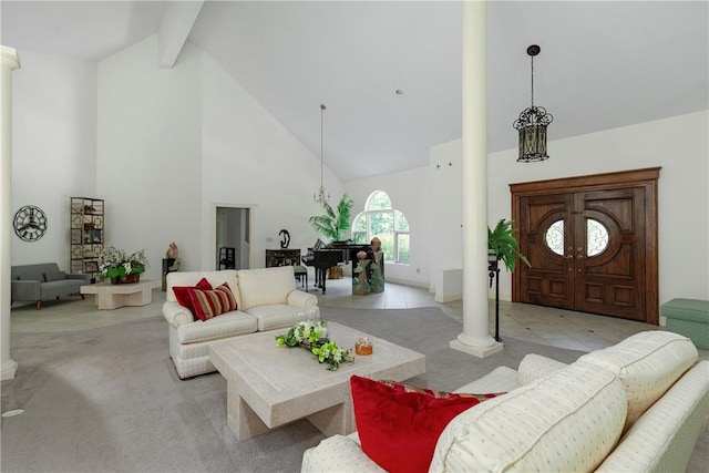 living room featuring light carpet, beam ceiling, decorative columns, and high vaulted ceiling