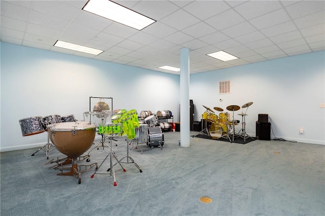 miscellaneous room featuring carpet flooring and a drop ceiling