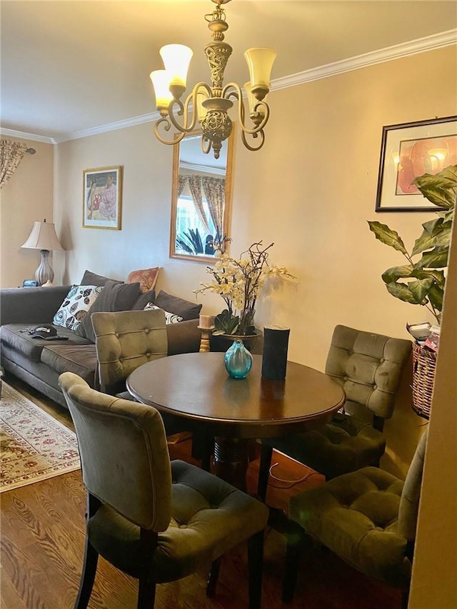3664 Palmer Ave, Bronx, NY 10466 - dining space with wood finished floors, a chandelier, and crown molding