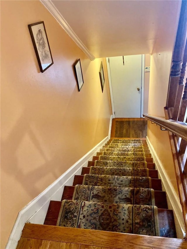 3664 Palmer Ave, Bronx, NY 10466 - stairway featuring baseboards and wood finished floors