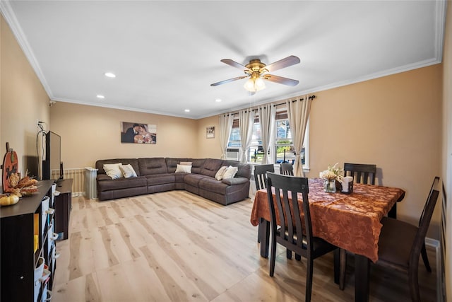 dining room featuring ceiling fan, light hardwood / wood-style floors, and ornamental molding