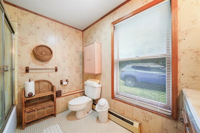 full bathroom with baseboard heating, tile patterned floors, crown molding, toilet, and vanity