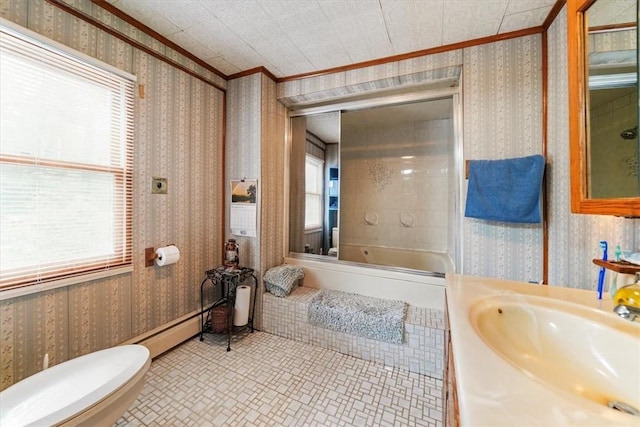 bathroom featuring crown molding, toilet, a bath, and vanity