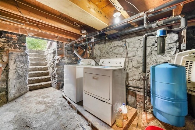 utility room featuring washing machine and dryer