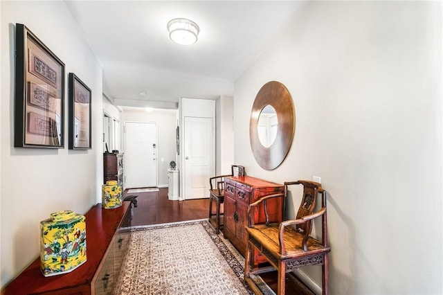 corridor featuring dark hardwood / wood-style floors