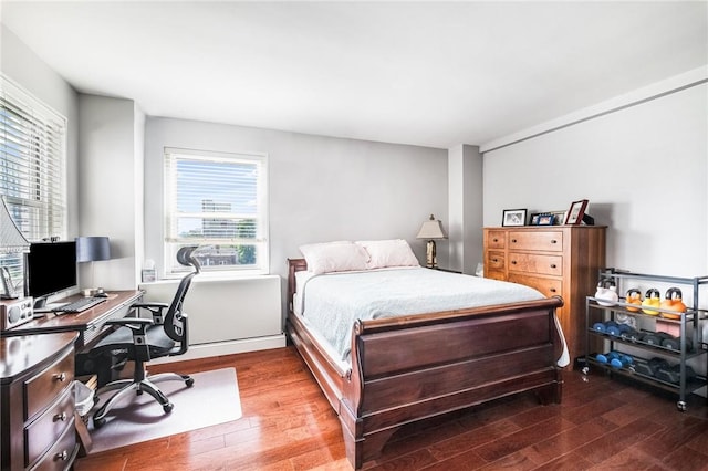 bedroom featuring wood-type flooring