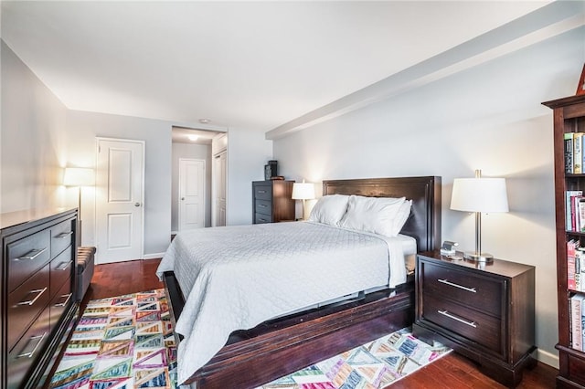 bedroom featuring dark wood-type flooring