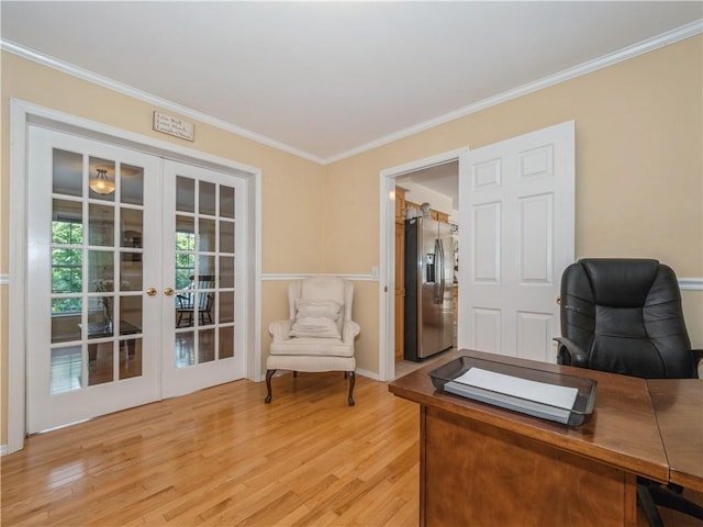 office with ornamental molding, french doors, and wood finished floors