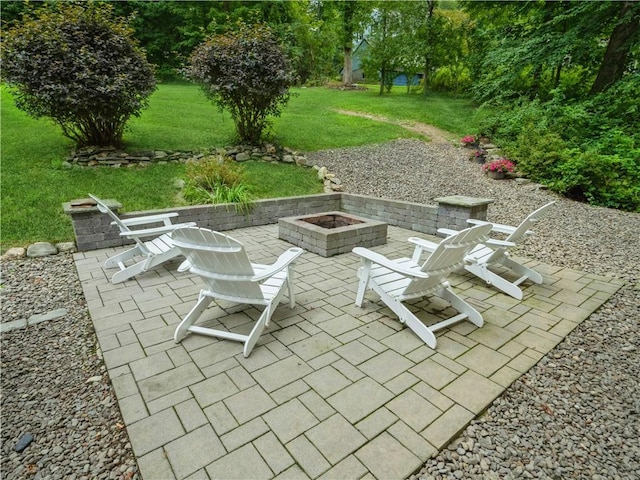 view of patio / terrace featuring a fire pit