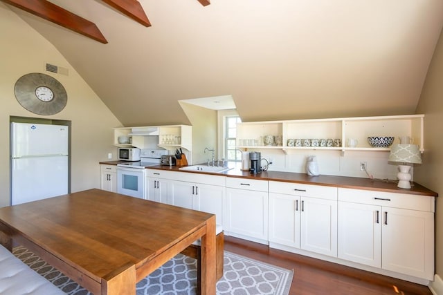 20 Smithfield Way, Amenia, NY 12501 - kitchen featuring white appliances, dark countertops, open shelves, dark wood finished floors, and white cabinetry