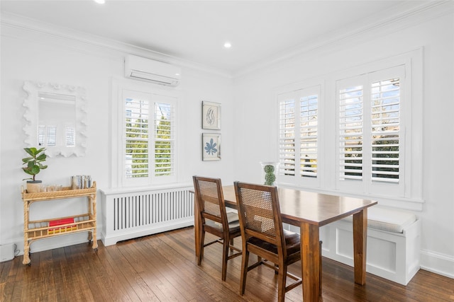 dining area with baseboards, radiator, hardwood / wood-style flooring, ornamental molding, and an AC wall unit