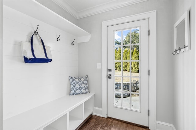 mudroom with baseboards, ornamental molding, and dark wood-type flooring