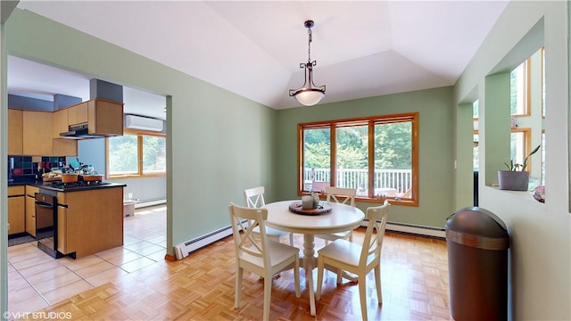 dining room featuring an AC wall unit, light parquet floors, a baseboard radiator, and vaulted ceiling