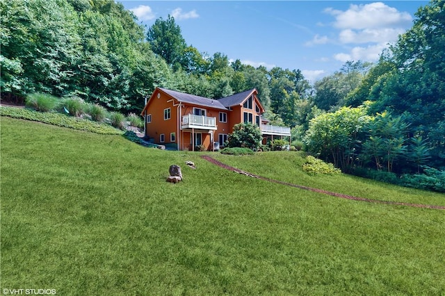 exterior space featuring a yard and a deck