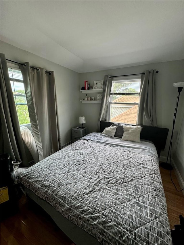 bedroom featuring dark hardwood / wood-style floors