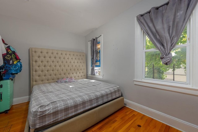 bedroom with wood-type flooring