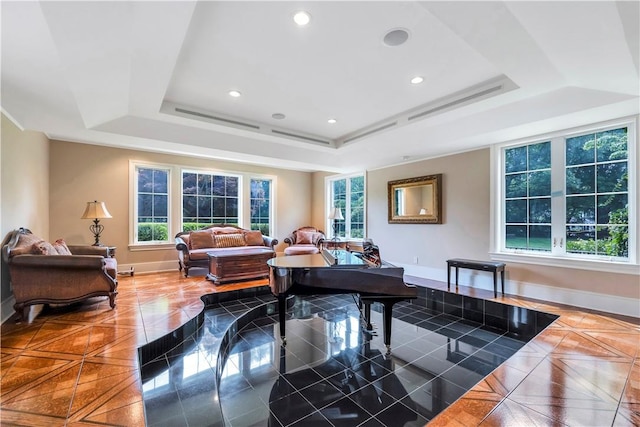 living room with a raised ceiling