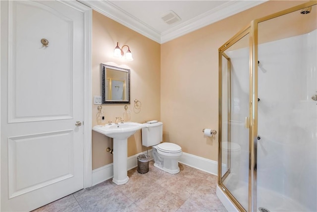 bathroom featuring toilet, crown molding, a shower with shower door, and sink