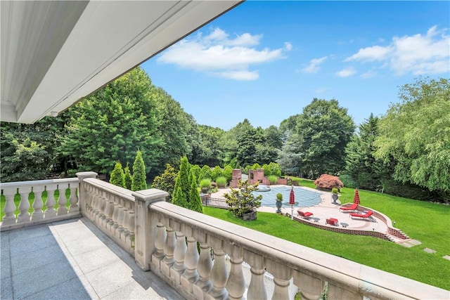 balcony featuring a patio area