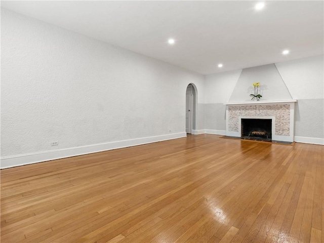 unfurnished living room with light hardwood / wood-style floors