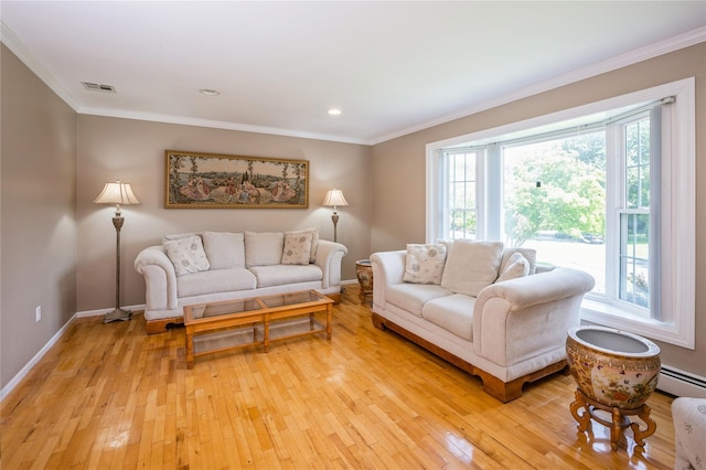 living room with ornamental molding, a baseboard radiator, and light hardwood / wood-style flooring