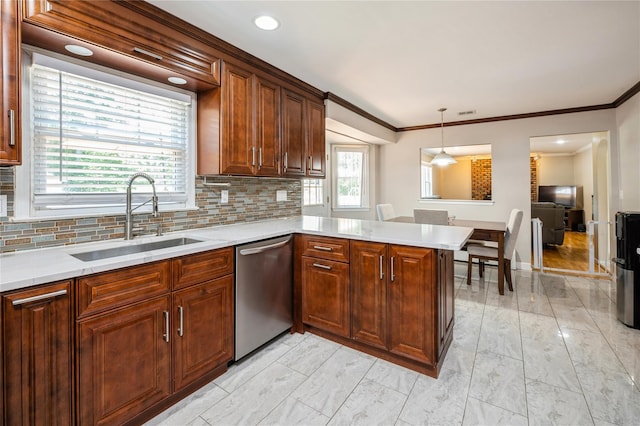 kitchen featuring dishwasher, sink, backsplash, kitchen peninsula, and pendant lighting