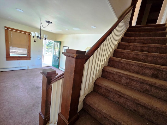 275-277 State Route 17b, Monticello, NY 12701 - stairs with recessed lighting, carpet floors, a chandelier, and a baseboard radiator