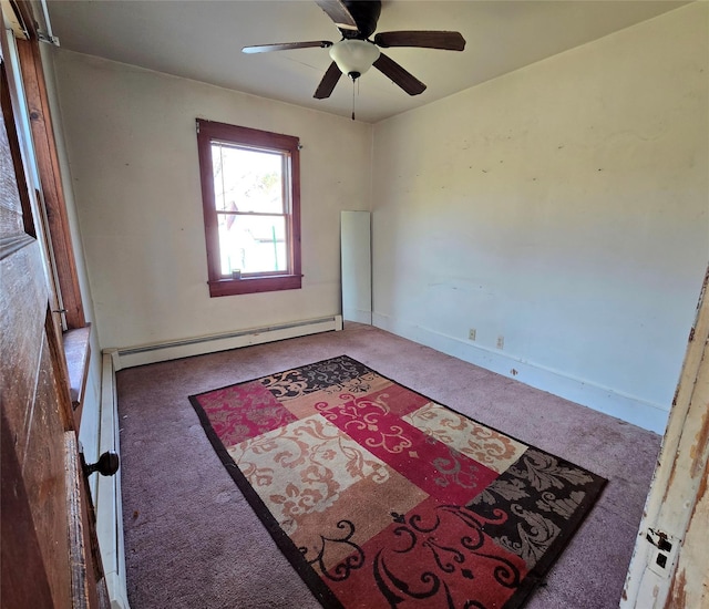 275-277 State Route 17b, Monticello, NY 12701 - carpeted empty room featuring a ceiling fan and a baseboard radiator