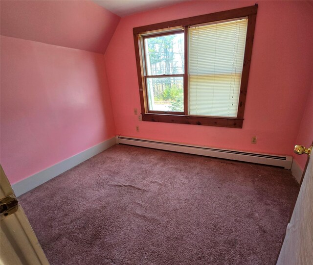 275-277 State Route 17b, Monticello, NY 12701 - bonus room featuring a baseboard heating unit, carpet flooring, lofted ceiling, and baseboards