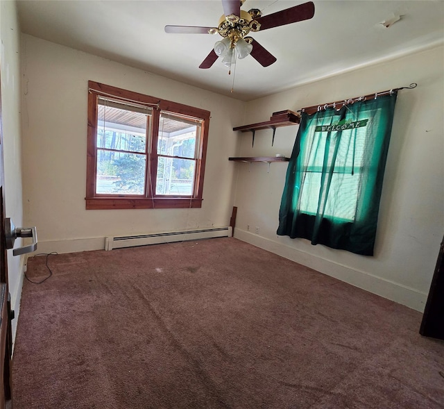 275-277 State Route 17b, Monticello, NY 12701 - spare room featuring baseboards, ceiling fan, a baseboard heating unit, and carpet flooring