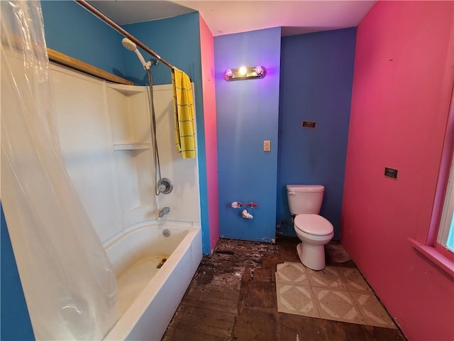 275-277 State Route 17b, Monticello, NY 12701 - bathroom featuring shower / tub combo with curtain and toilet