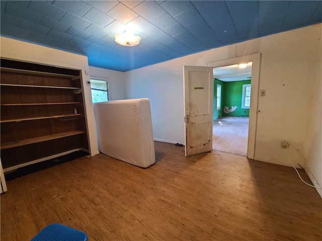 275-277 State Route 17b, Monticello, NY 12701 - unfurnished bedroom with wood finished floors