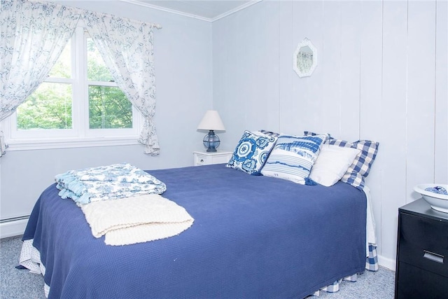 bedroom featuring carpet floors, a baseboard radiator, and ornamental molding