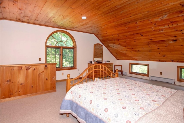 carpeted bedroom featuring crown molding, wood ceiling, baseboard heating, and vaulted ceiling