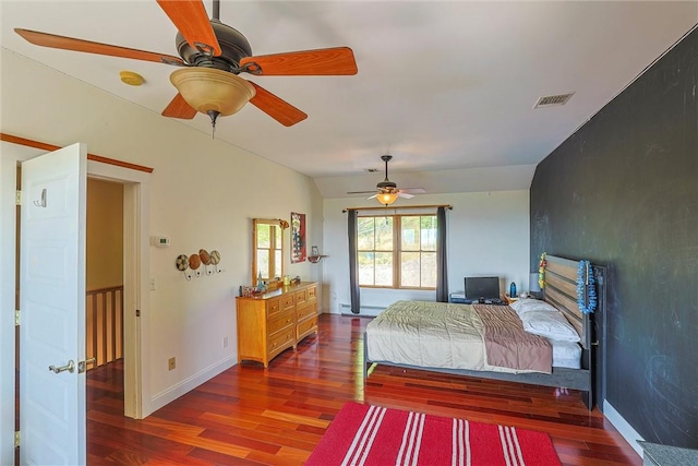 bedroom featuring ceiling fan and dark hardwood / wood-style floors