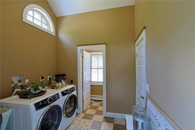 clothes washing area with independent washer and dryer and baseboard heating