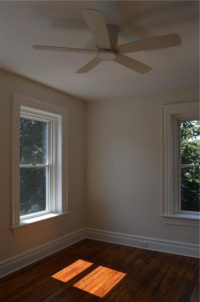 unfurnished room with ceiling fan and hardwood / wood-style floors