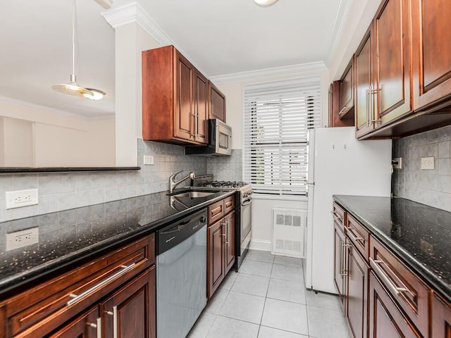 kitchen with backsplash, sink, stainless steel appliances, and ornamental molding