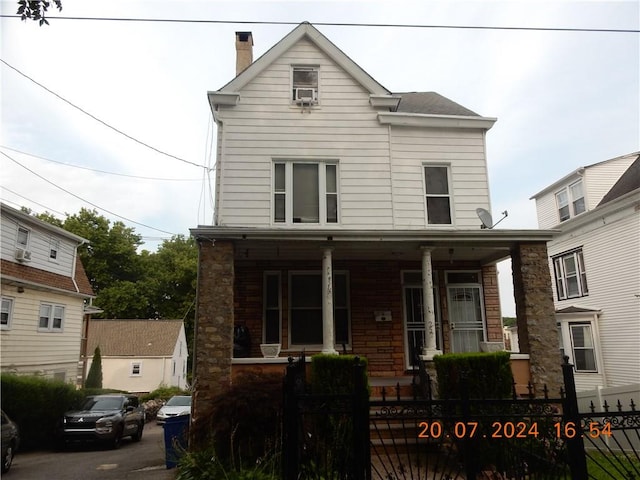 front facade featuring covered porch