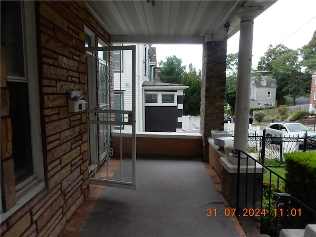 balcony featuring a porch