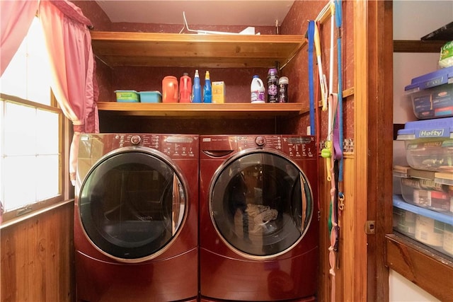 clothes washing area with washer and dryer