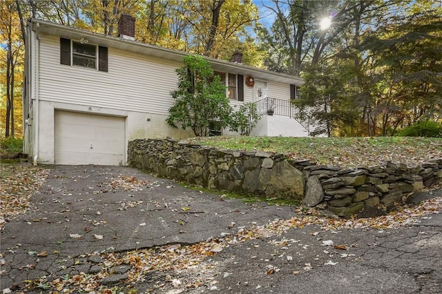 view of front of home with a garage