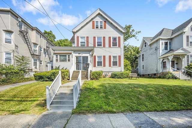 view of front of home featuring a front lawn