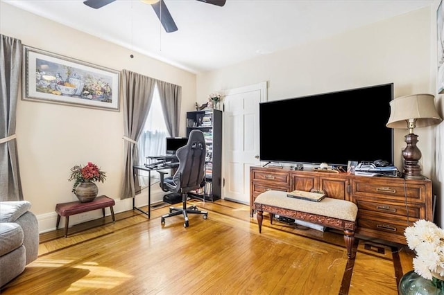 office area with light hardwood / wood-style flooring